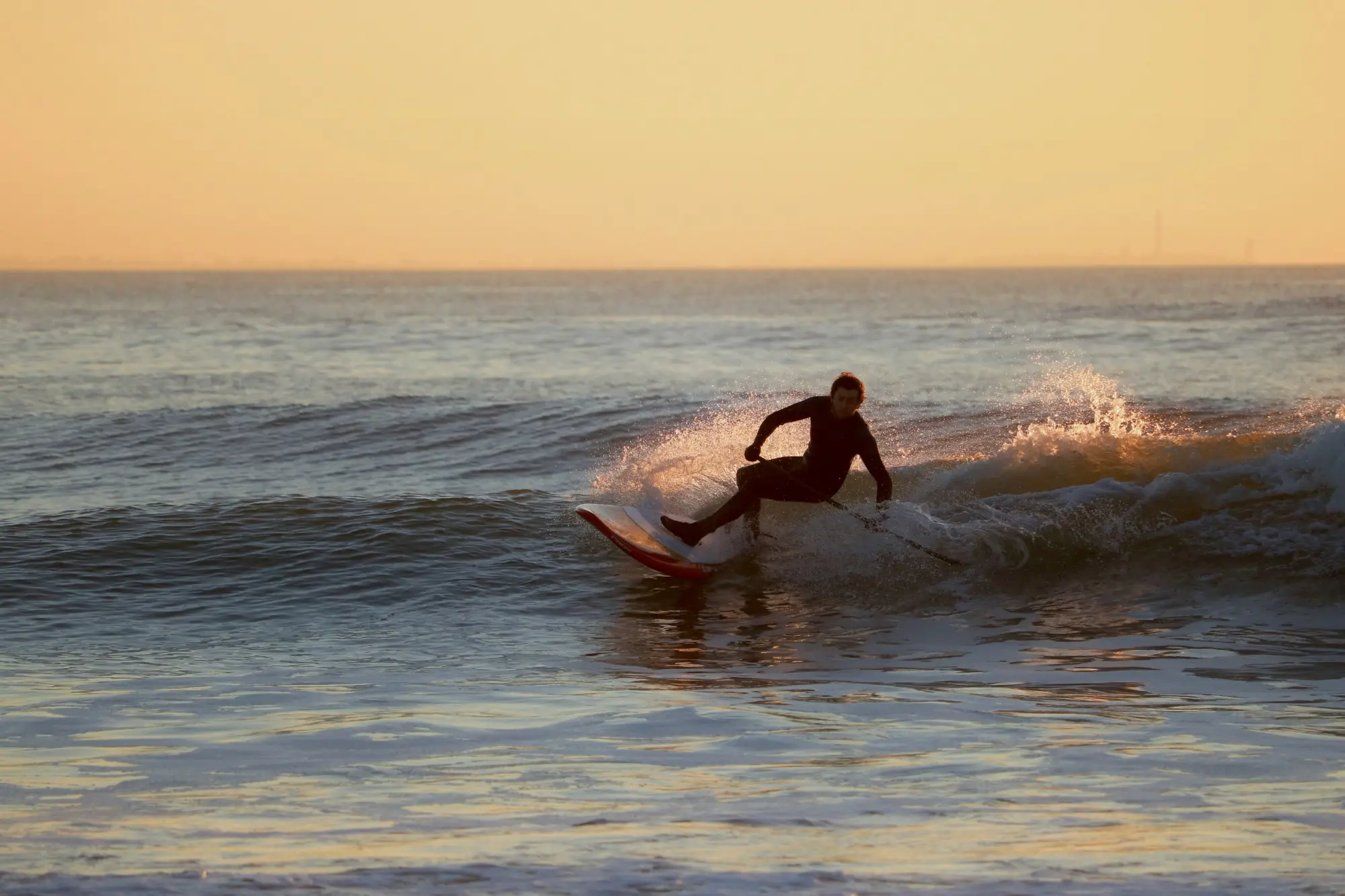 Carcavelos%20surfing%20at%20sunset.webp